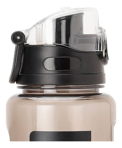 Botella Puma Training Sportstyle 600ml  05351801 Color Negro Marrón Claro
